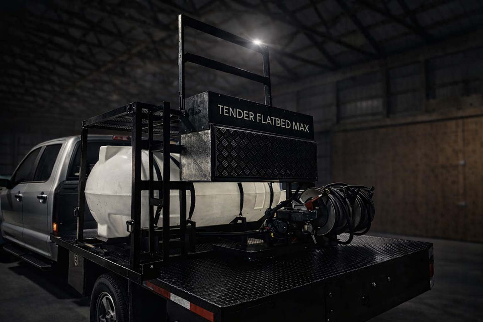 6cb2a961-a57a-4475-a161-70930e281bb0 Flatbed Max truck-mounted tender with spray drone mounted on platform in field setup