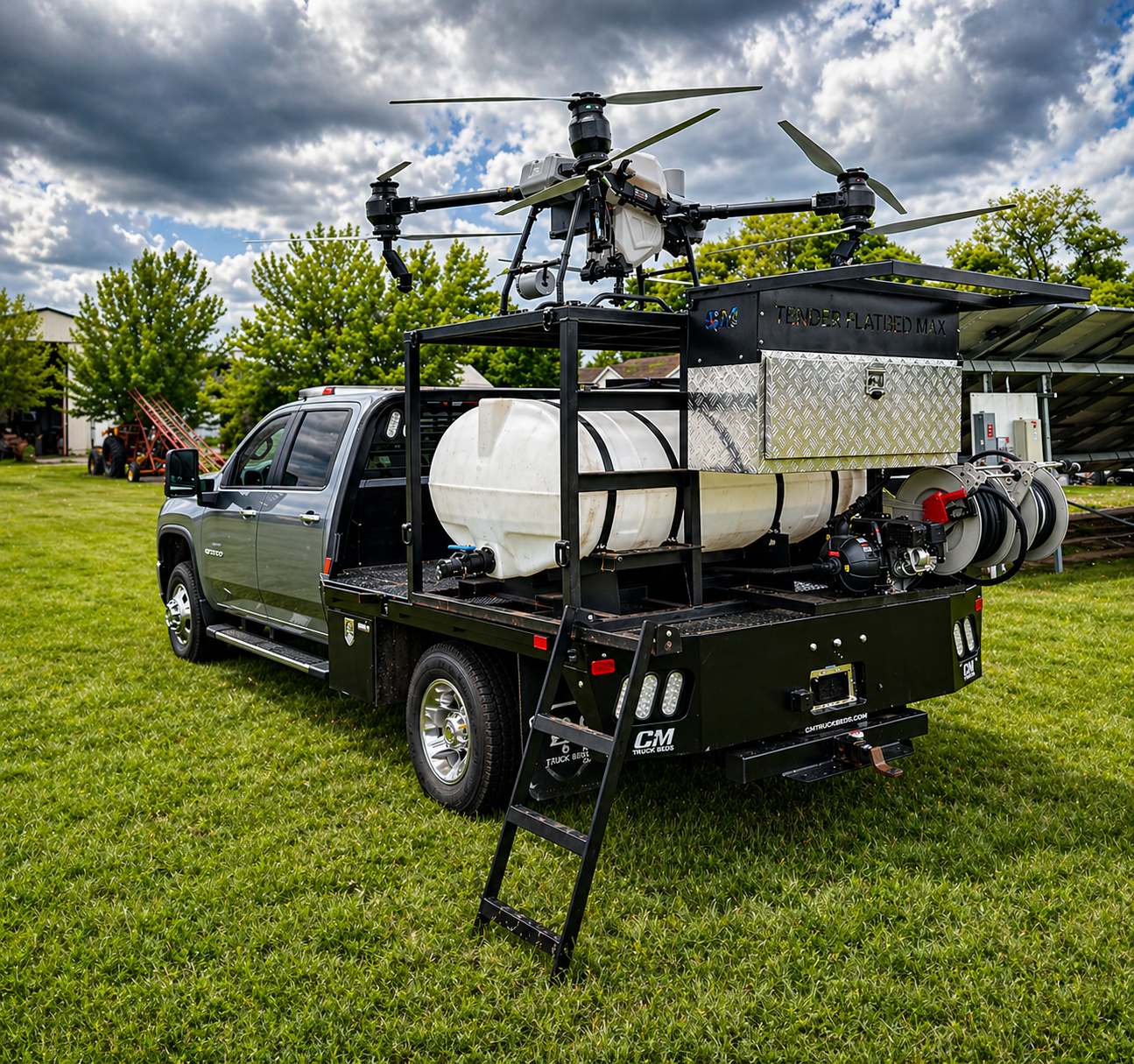 Flatbed Max truck-mounted tender with spray drone mounted on platform in field setup